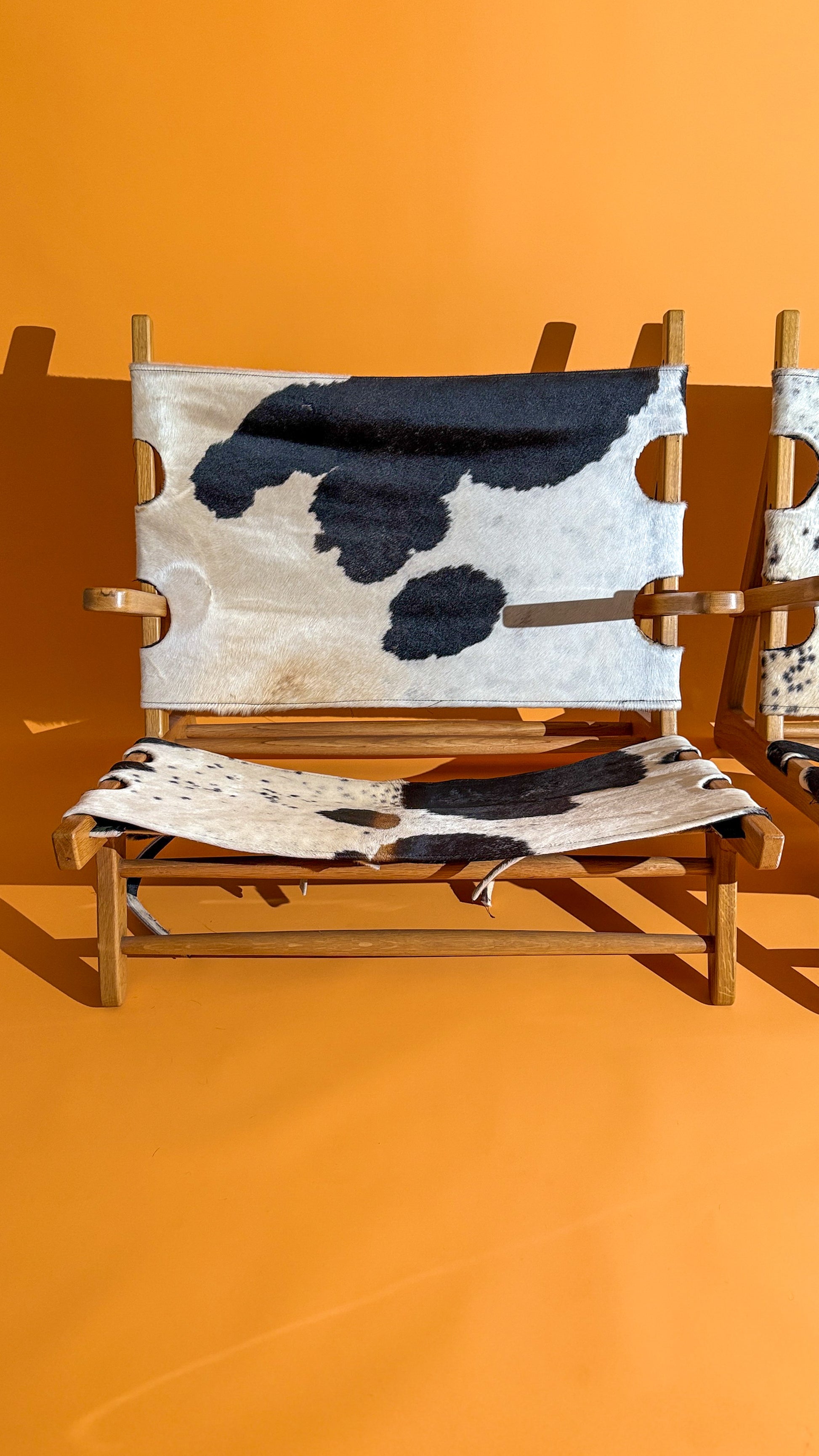 Vintage Lowline Cowhide Sling Chairs (Set of 2)